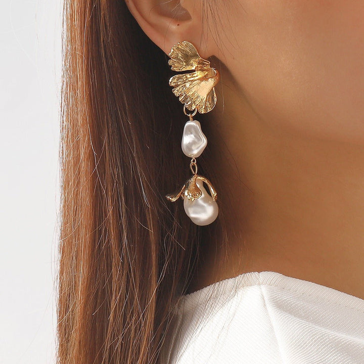 Shaped pearl earrings, metal wind leaves