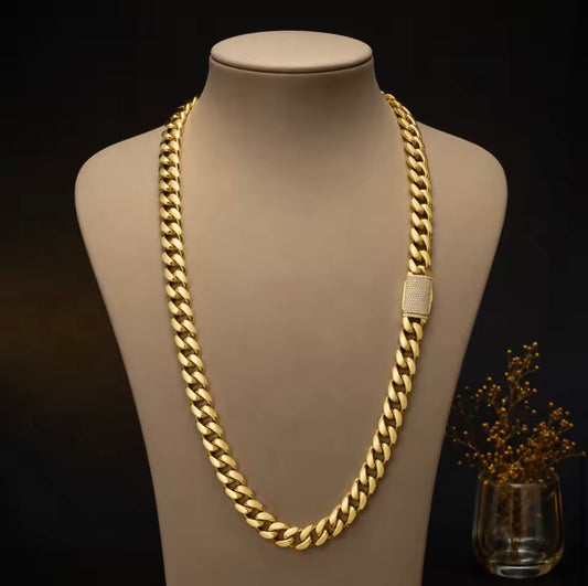14mm gold Cuban link necklace on display