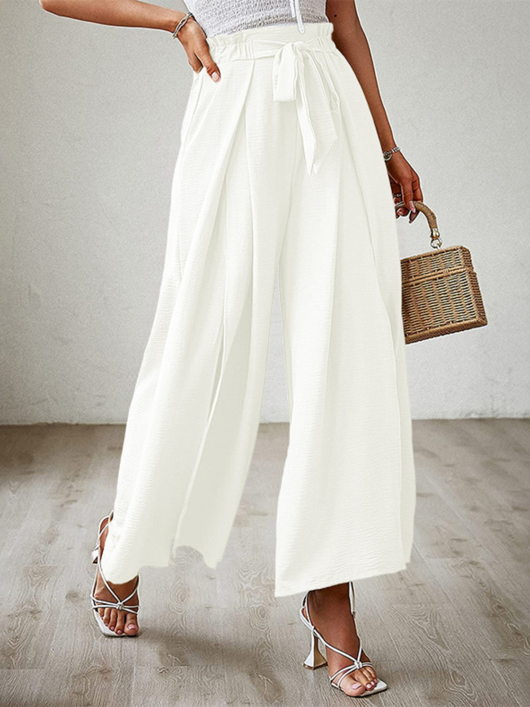 Elegant High-Waisted Trousers with Split Leg Design