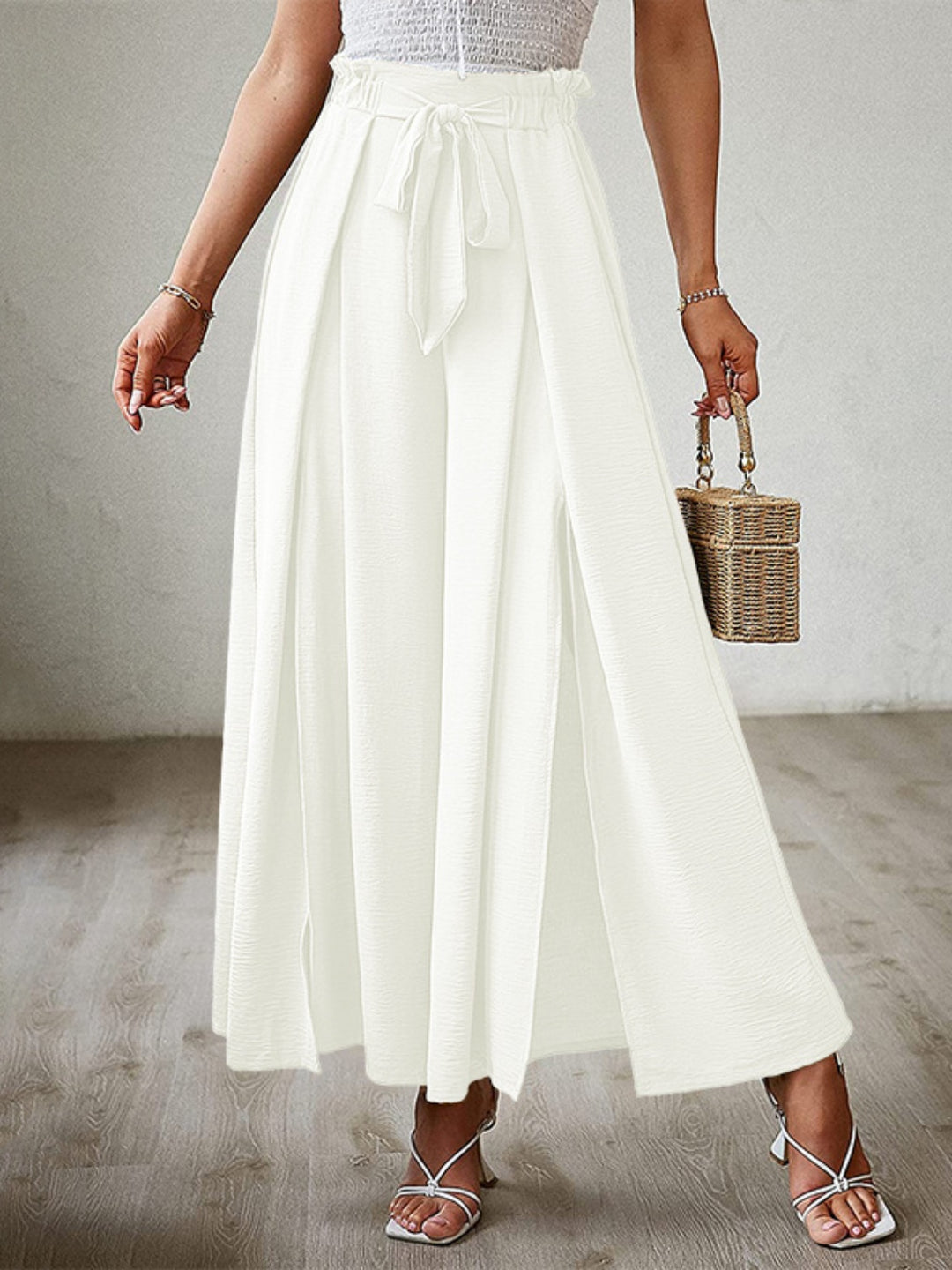 Elegant High-Waisted Trousers with Split Leg Design