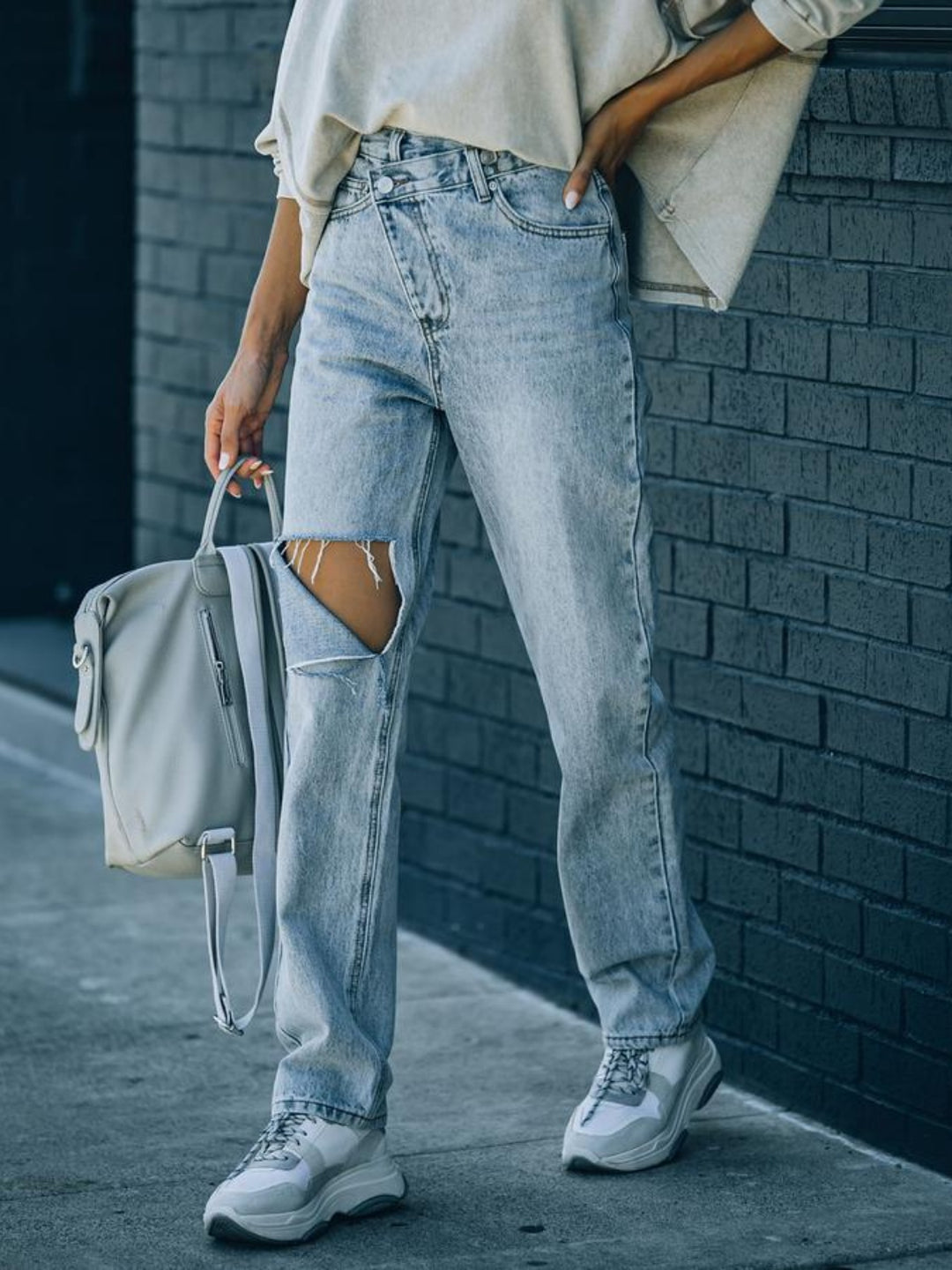 Asymmetrical Ripped High-Waist Jeans