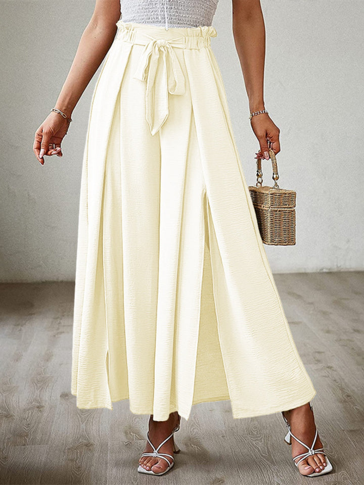 Elegant High-Waisted Trousers with Split Leg Design