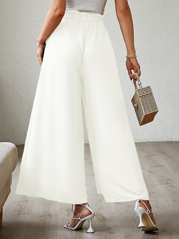 Elegant High-Waisted Trousers with Split Leg Design