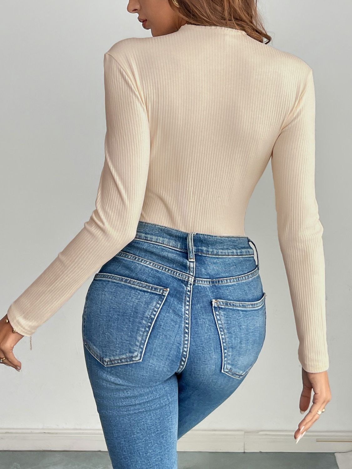 Perfee Chic Button-Detail Long Sleeve Bodysuit for Women