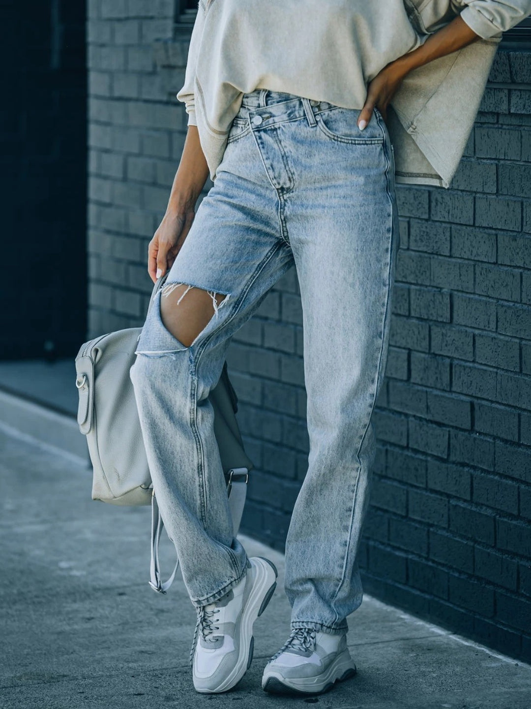 Asymmetrical Ripped High-Waist Jeans