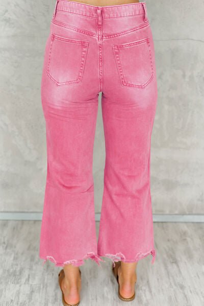 Chic Distressed Denim Jeans with Trendy Raw Hem and Practical Pockets