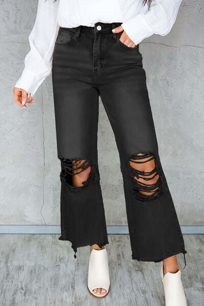 Chic Distressed Denim Jeans with Trendy Raw Hem and Practical Pockets