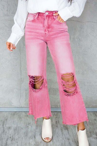 Chic Distressed Denim Jeans with Trendy Raw Hem and Practical Pockets