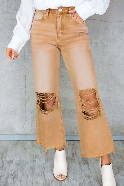 Chic Distressed Denim Jeans with Trendy Raw Hem and Practical Pockets