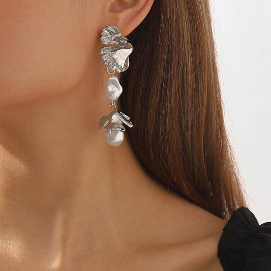 Shaped pearl earrings, metal wind leaves