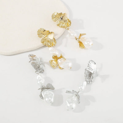 Shaped pearl earrings, metal wind leaves