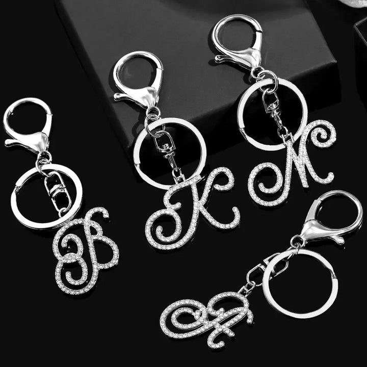 "Shimmering Scriptz - 26 Sparkling Initials Crystal Keychains in Silver Alloy (A-Z Letters)"